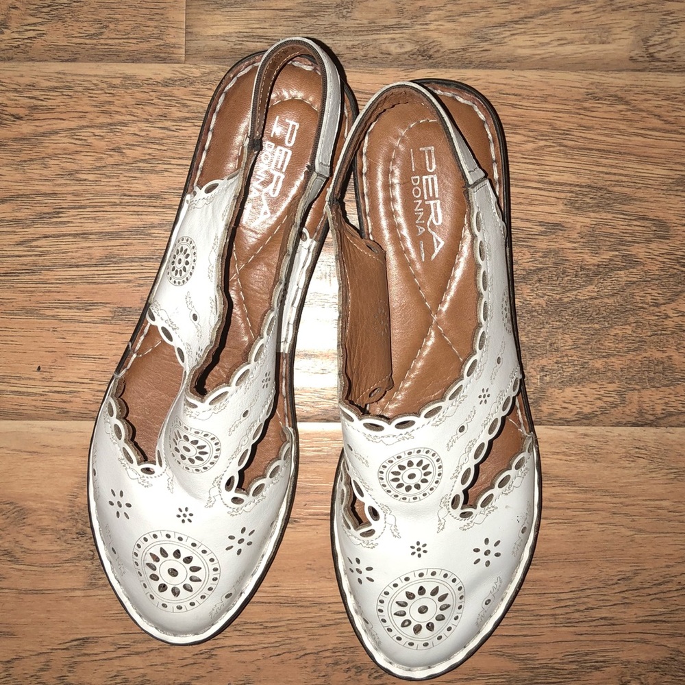 White sandals , flats